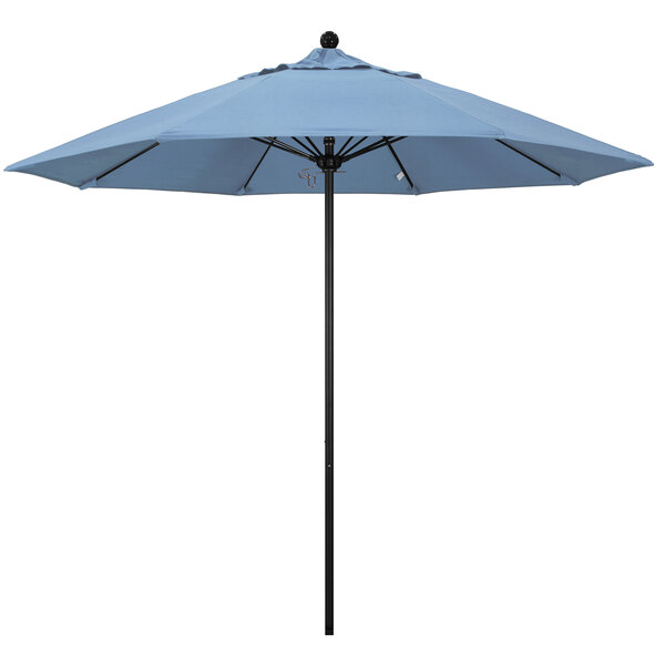 A close-up of a California Umbrella with an Air Blue Sunbrella canopy.
