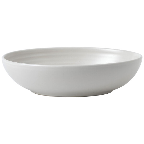 A white Dudson stoneware bowl with a matte finish on a white background.