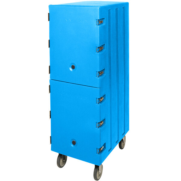 A light blue plastic Cambro double compartment food storage box carrier on wheels.