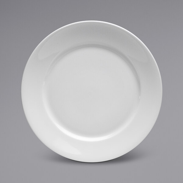 A Sant'Andrea Queensbury bright white porcelain plate with a wide white rim.