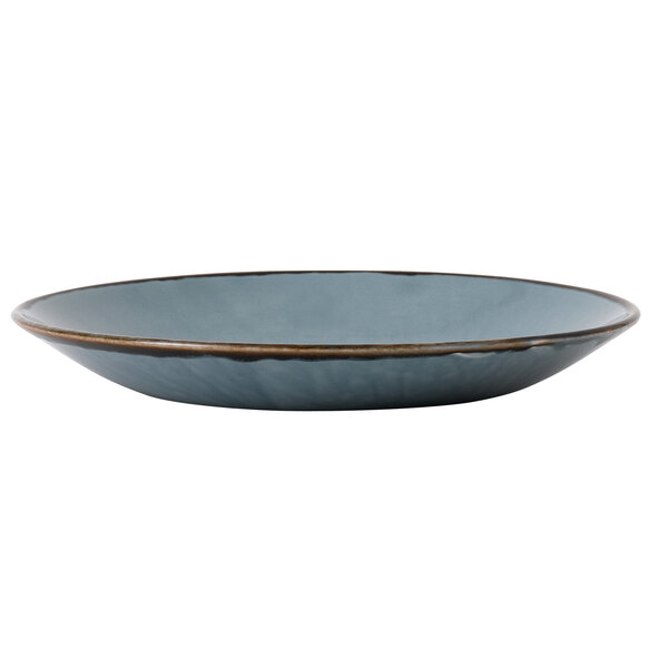 A Dudson Harvest blue china plate with a deep coupe shape.