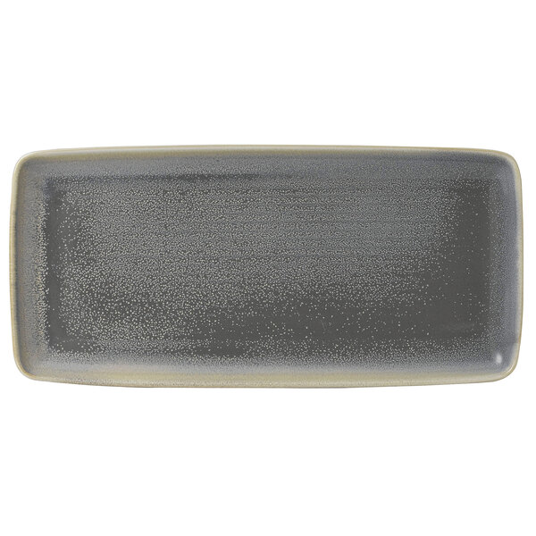 A rectangular matte granite stoneware platter with white specks on a grey background.