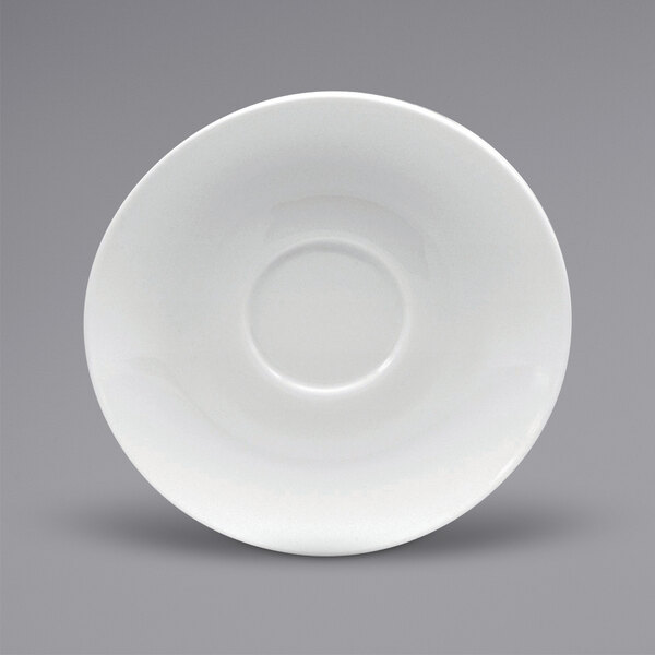 A bright white round porcelain saucer with a small rim.