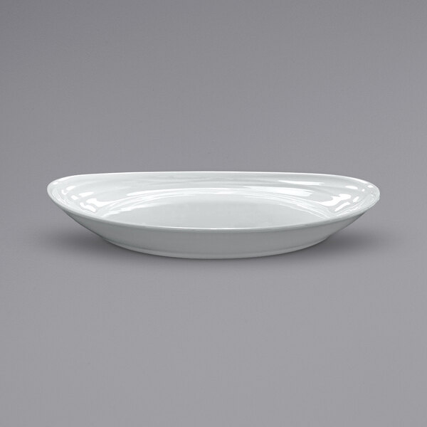 A white oval porcelain platter with an embossed design.