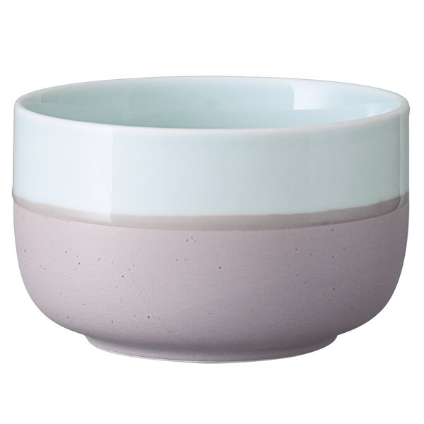A Luzerne porcelain bowl with a white and grey speckle  rim.