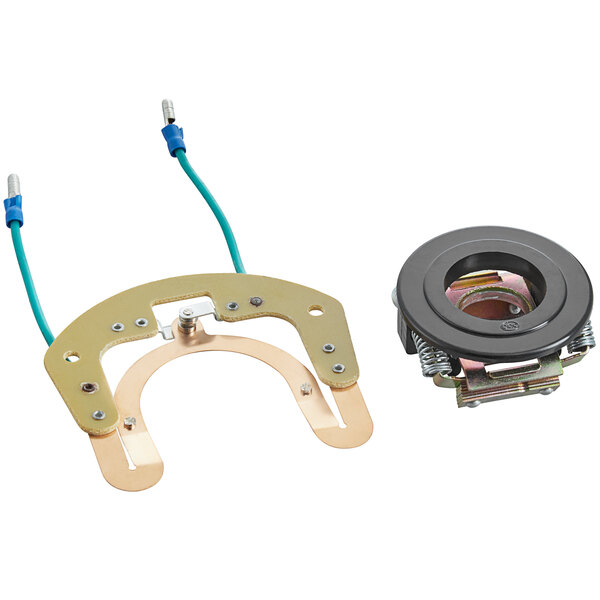 A close-up of a metal Avantco Motor Switch with white plastic and metal components.