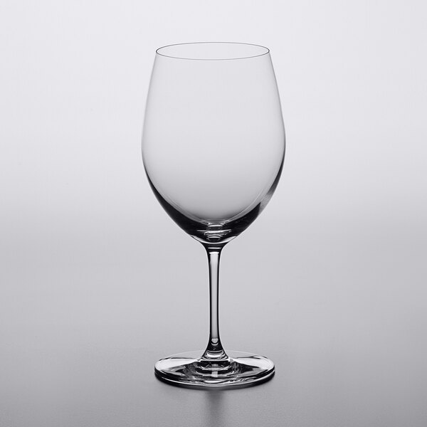 A Lucaris Bliss Bordeaux wine glass on a white surface.