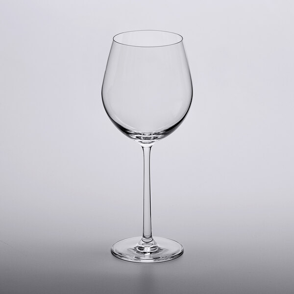 A close-up of a clear Lucaris Soul burgundy wine glass.