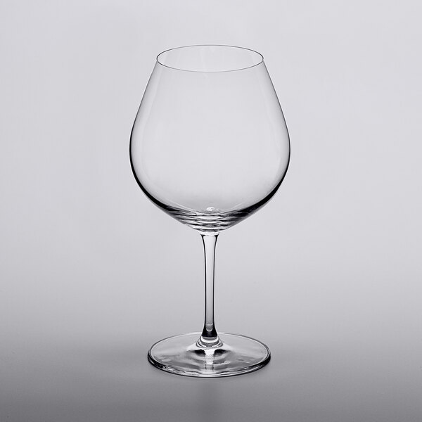 A close-up of a clear Lucaris Bliss burgundy wine glass.