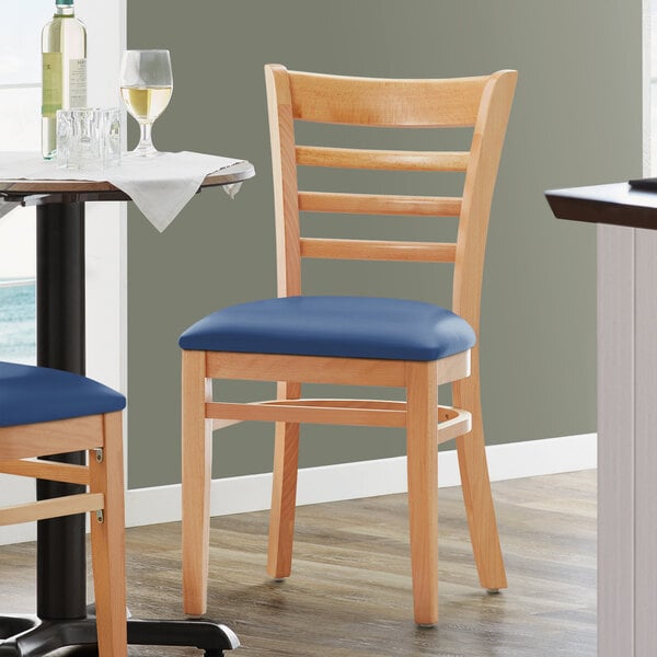 Lancaster Table & Seating Natural Finish Wooden Ladder Back Chair with 2 1/2" Navy Padded Seat