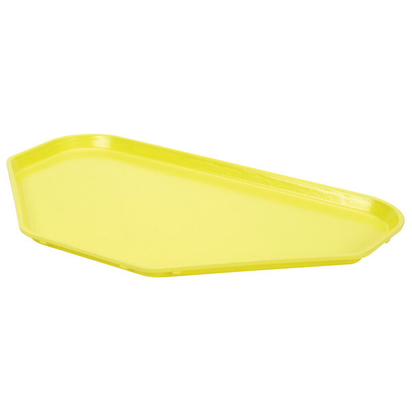 A yellow trapezoid fiberglass MFG Tray on a white background.