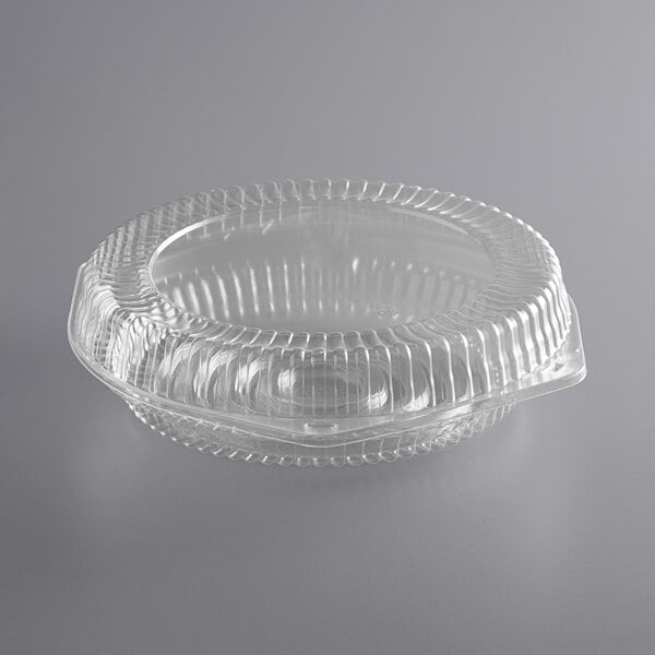 A clear plastic Choice pie container with a low dome lid.