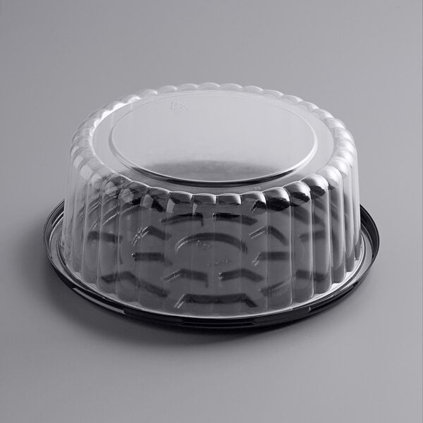 A clear plastic Choice cake display container with a clear lid.