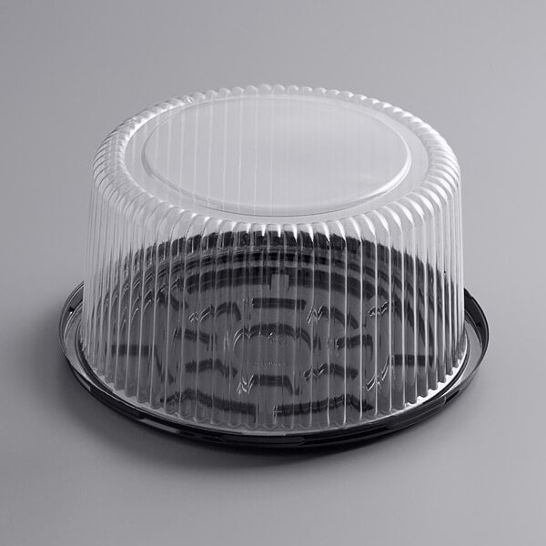 A Choice plastic cake container with a clear dome lid.