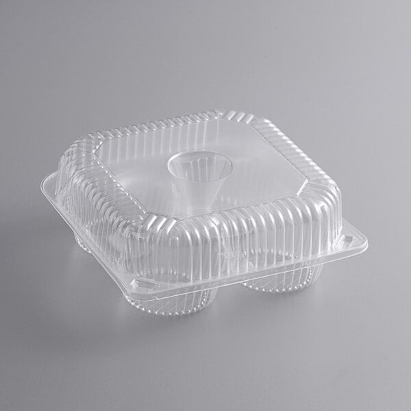 A clear plastic Choice jumbo cupcake container with 4 compartments and a lid.