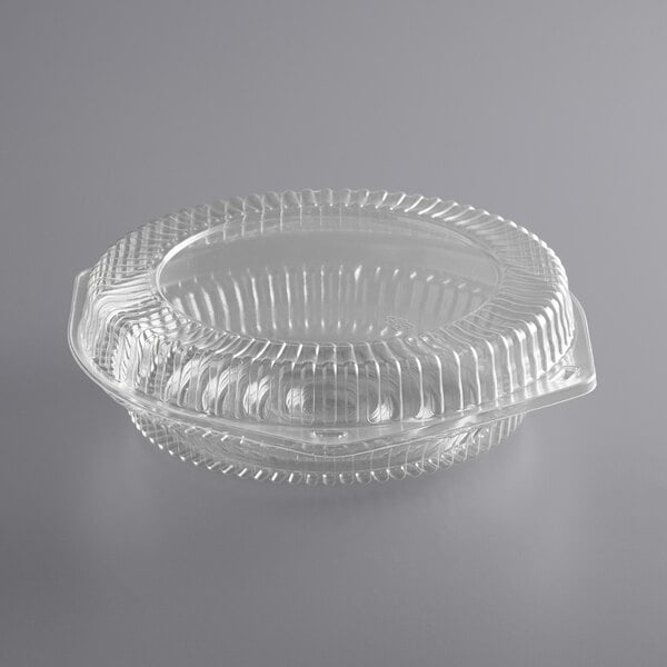 A clear plastic Choice pie container with a hinged lid.