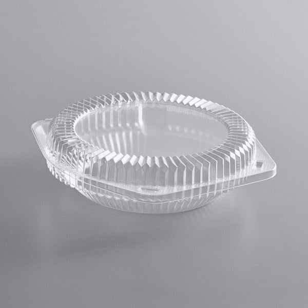 A Choice clear plastic pie container with low dome lid.