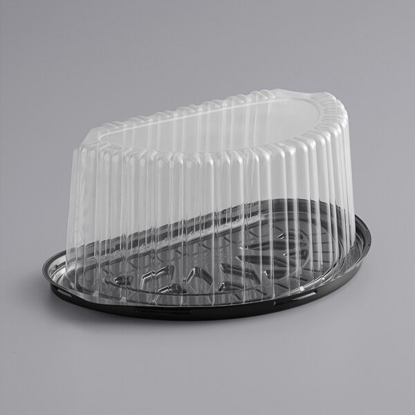 A plastic Choice cake container with a dome lid.