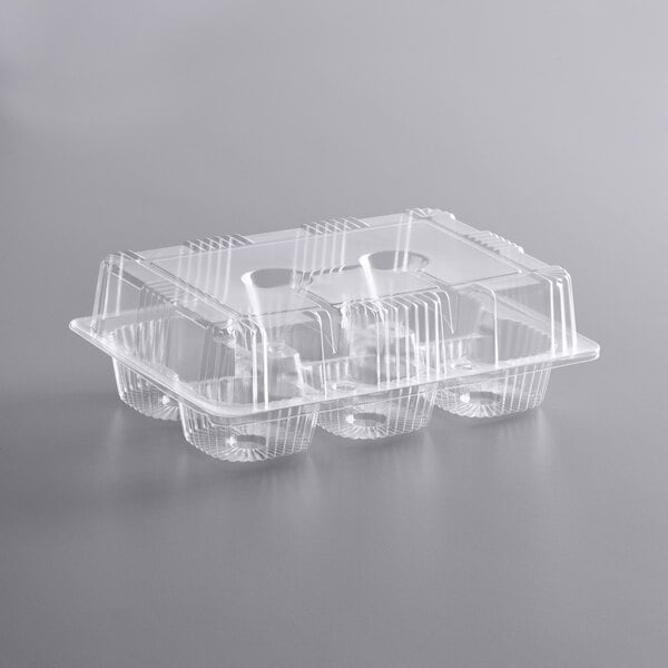 A clear plastic Choice cupcake and muffin container with four compartments and a clear lid.