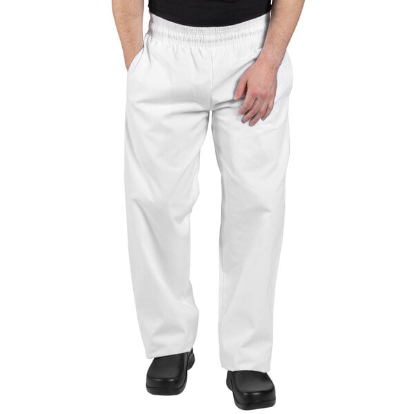 A man wearing Uncommon Chef white chef pants.