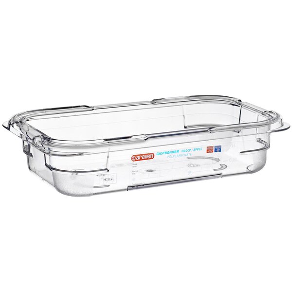 An Araven clear plastic food pan on a counter.