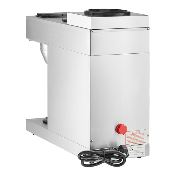 An automatic coffee maker with a stainless steel body, three decanter warmers, and a visible power cord.