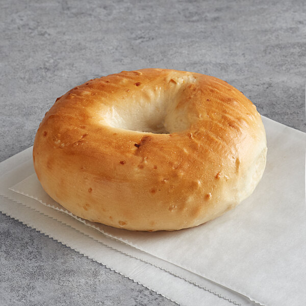 An Original New York Style Onion Bagel on a plate.