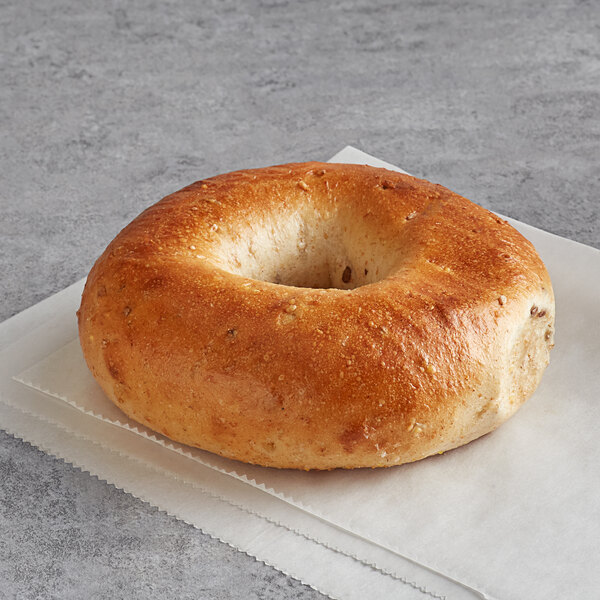 An Original New York Style Ancient Grain Bagel on a paper towel.