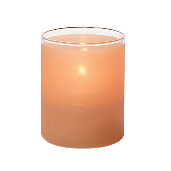 A Hollowick satin terra cotta glass cylinder tealight with a lit candle inside.