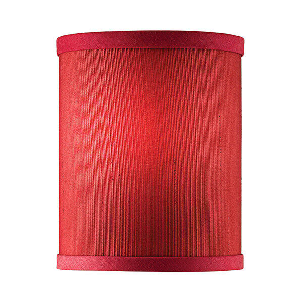 A close up of a red cylinder shade for a Hollowick candlestick lamp.