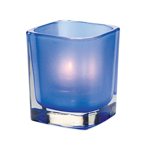 A Hollowick Tetra Satin Dark Blue glass square candle holder.