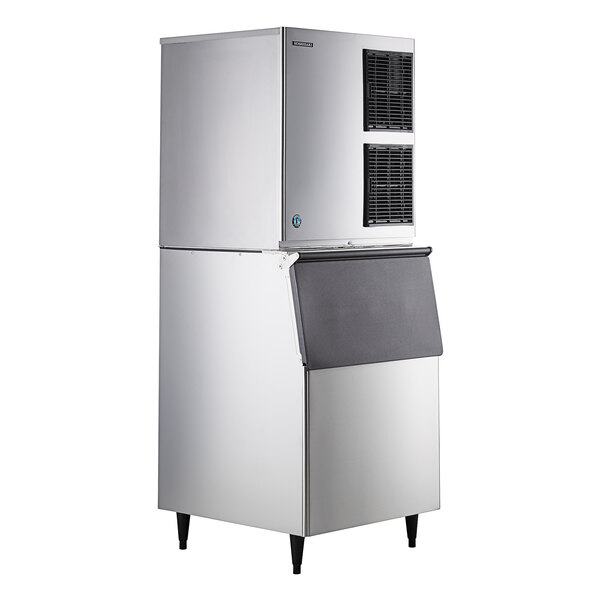 A large stainless steel Hoshizaki air cooled ice machine with a black lid.