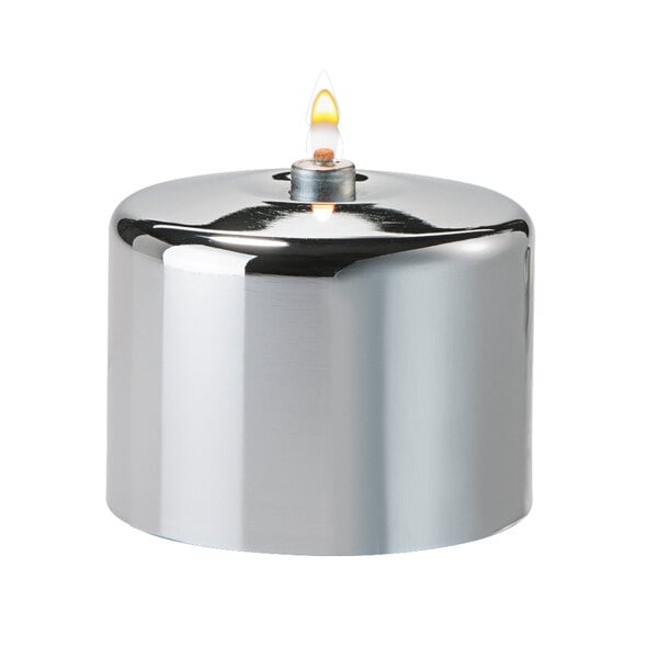 A silver cylindrical Hollowick candle cover with a flame.