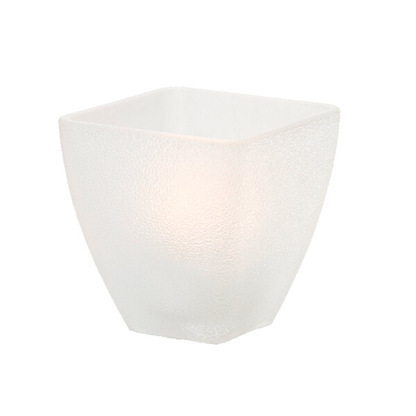 A frosted glass Hollowick Odyssey votive with a lit candle inside.