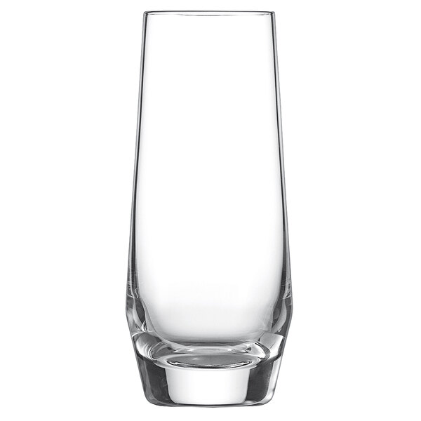 A Schott Zwiesel Pure juice glass filled with a clear liquid.