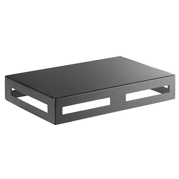 A black metal rectangular multifunctional riser with holes in the sides.