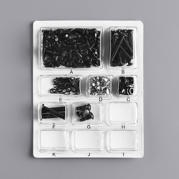 A clear plastic container with screws and bolts in it.