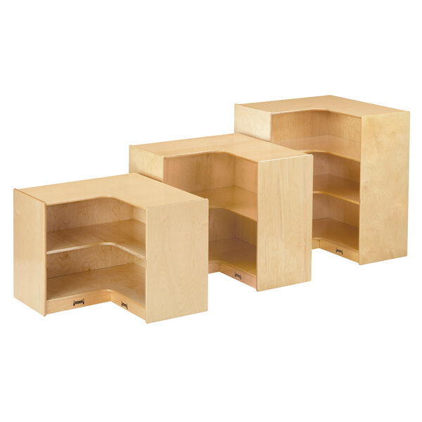 A Jonti-Craft Baltic Birch wood inside corner storage cabinet with two shelves inside.
