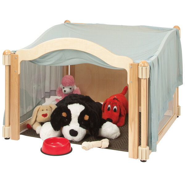 A KYDZ Suite Imagination Nook with stuffed animals and a stuffed dog toy.