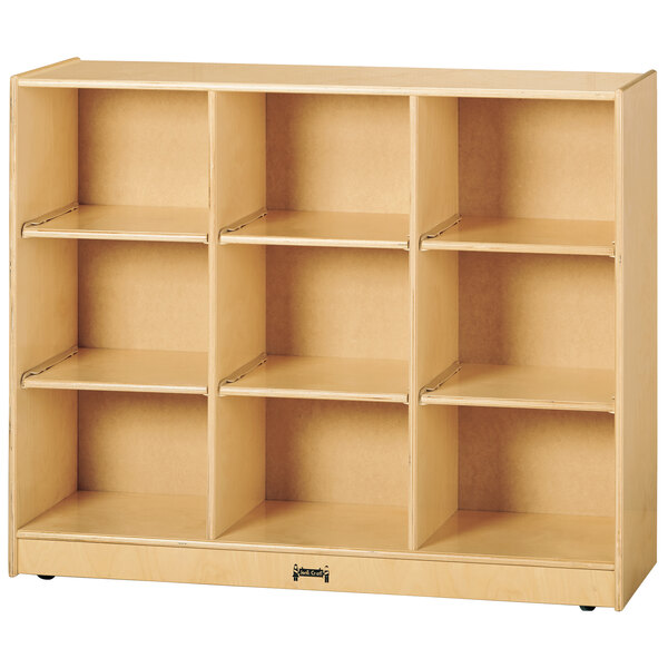 A Jonti-Craft wooden mobile storage cabinet with 9 cubbies.