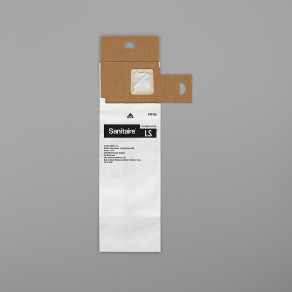 A white package of Sanitaire paper vacuum bags with a brown label.