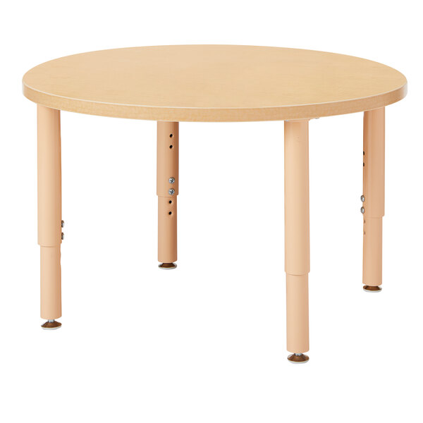 A Jonti-Craft round wooden table with adjustable legs.