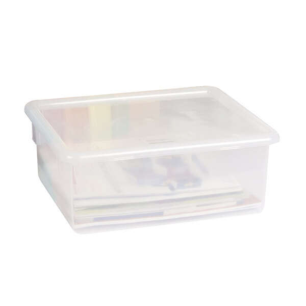 A clear plastic container lid.