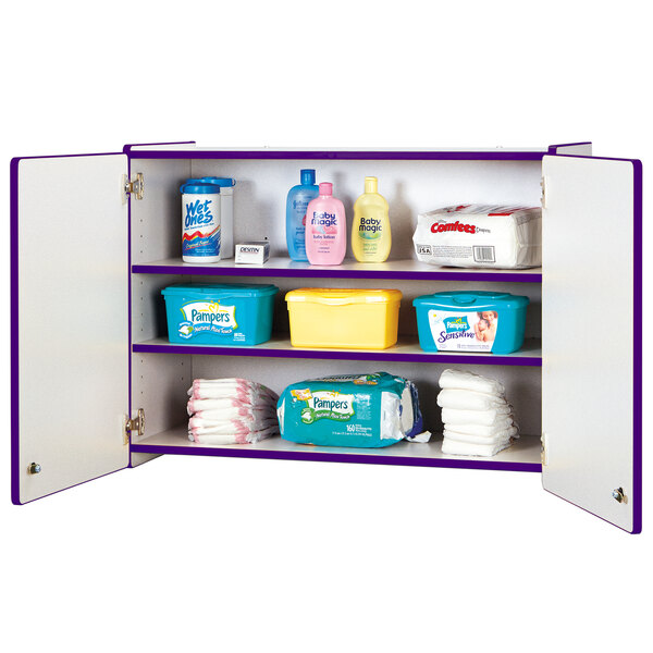 A Rainbow Accents purple and gray locking wall-mount storage cabinet with baby supplies on a shelf.