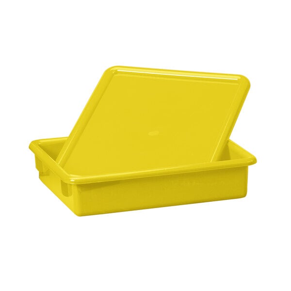A yellow plastic paper tray for Jonti-Craft paper-tray storage units.