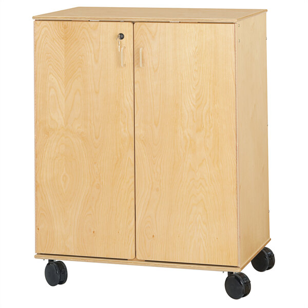 A Jonti-Craft wooden mobile supply cabinet with wheels.