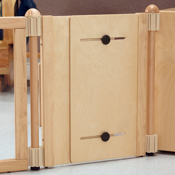 A T-Height plywood accordion panel with two wooden handles.
