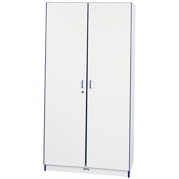A white storage closet with blue trim.
