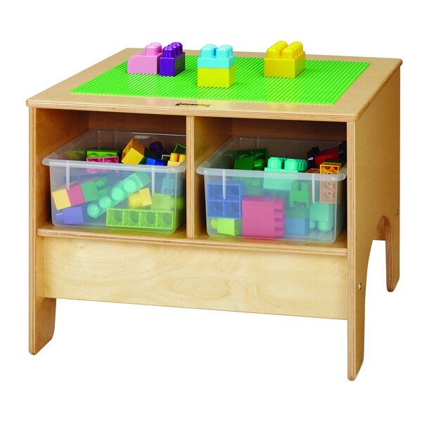 A Jonti-Craft wooden table with two plastic bins holding colorful bricks.