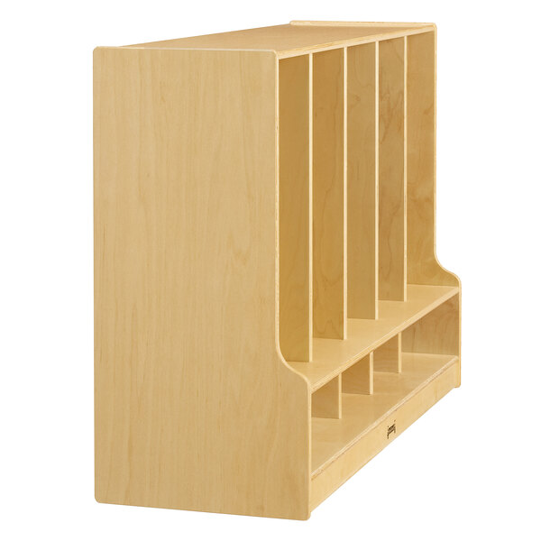 A Jonti-Craft wooden coat locker with shelves.